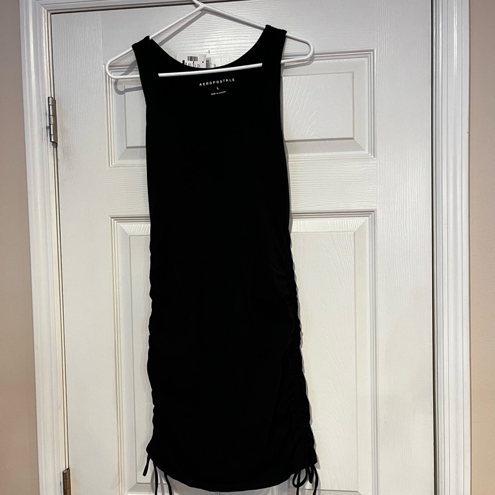 Black tank with side shiring